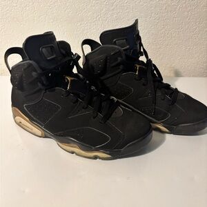 Jordan 6 “DMP” in black and gold